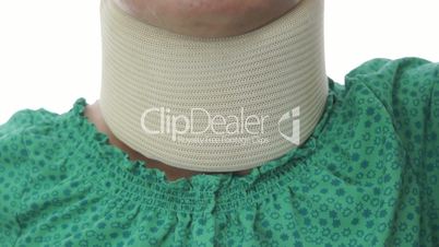 Woman In Neck Brace Tilt Up Close