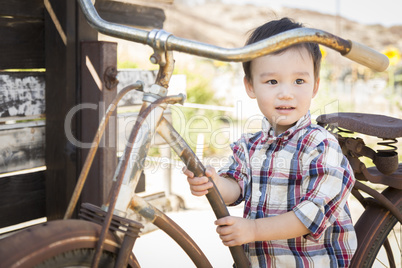 Mixed Race Young Boy Having Fun on the Bicycle