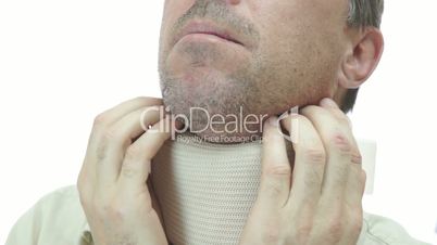 Man in Neck Support Brace Scratching