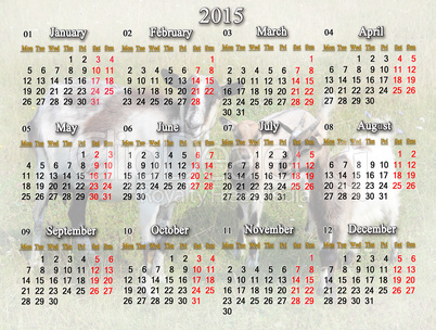 calendar for 2015 year with goat and two kids