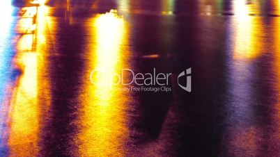 bokeh of night glares reflected from sea water