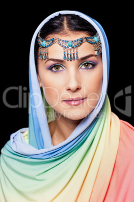 Portrait of young beautiful woman in oriental style