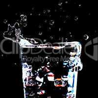 Glass with splashing water