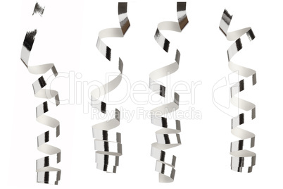 Silver ribbons in front of white background
