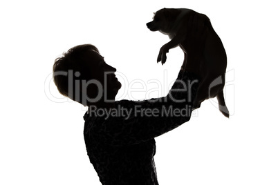 Photo of a woman's silhouette with the dog