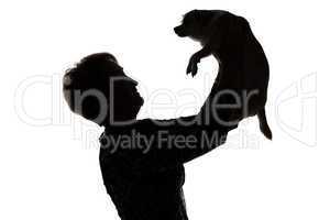 Photo of a woman's silhouette with the dog