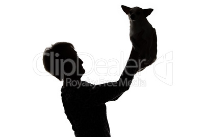 Image of a woman's silhouette with the dog