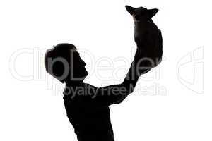 Image of a woman's silhouette with the dog