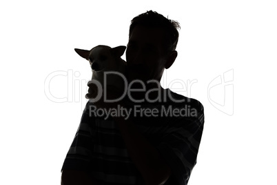 Silhouette of a man with the dog