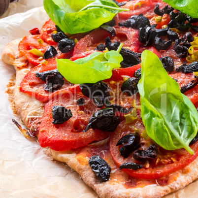 homemade olive - tomato pizza