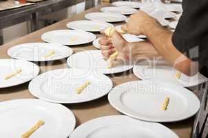 chef prepares dishes