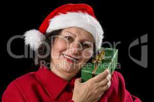 Senior Lady with Santa Claus Hat and Wrapped Gift.