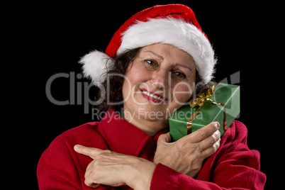 Smiling Female Senior with Red Santa Claus Cap.