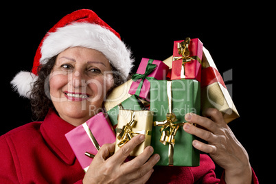 Smiling Old Woman is Holding Seven Wrapped Gifts.