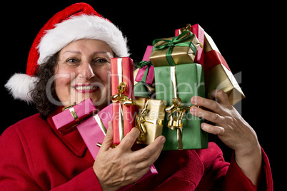 Happy Female Senior Lifting Many Wrapped Presents.