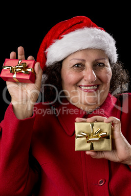 Happy Old Woman with Santa Hat and Two Xmas Gifts.
