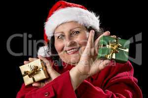 Smiling Female Senior Showing Two Wrapped Gifts.