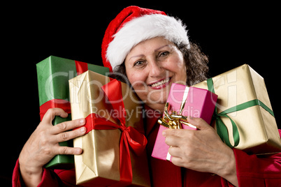 Smiling Aged Woman Embracing Four Wrapped Gifts.