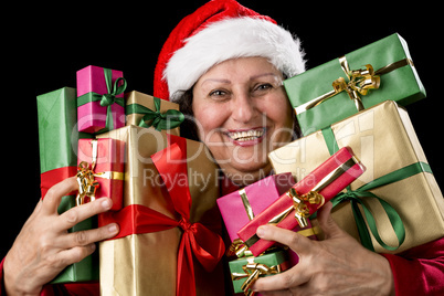 Cheerful Aged Woman Embracing Wrapped Presents .