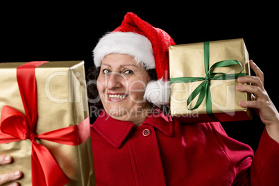 Happy Old Lady in Red with Wrapped Golden Gifts.