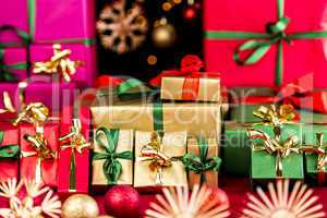 Many Christmas Presents Grouped by Color