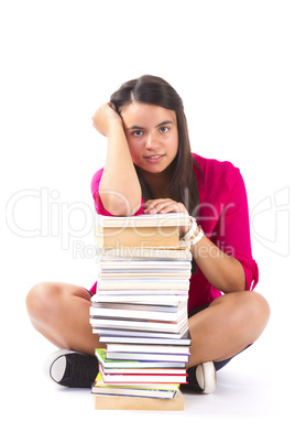 Portrait of a girl teenager with her books on white