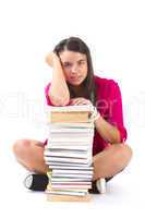Portrait of a girl teenager with her books on white