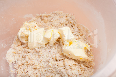 Closeup of butter in mixing bowl