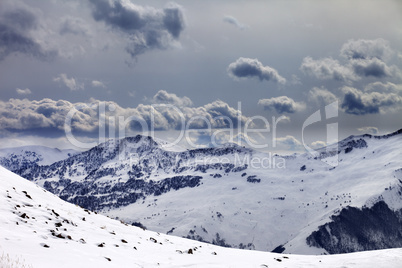 Mountains in evening and cloudy sky