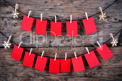 Many Empty Red Tags in Front of Wooden Background