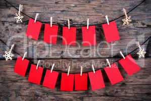Many Empty Red Tags in Front of Wooden Background