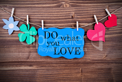 Blue TagWith Phrase Do What You Love On It Hanging on a Line