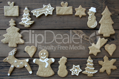 Decorated Ginger Breads on Wood