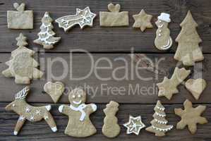 Decorated Ginger Breads on Wood