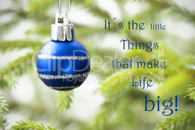 Closeup Of A Blue Christmas Ball With Life Quote