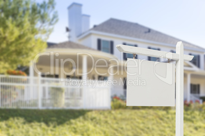 Blank Real Estate Sign in Front of New House