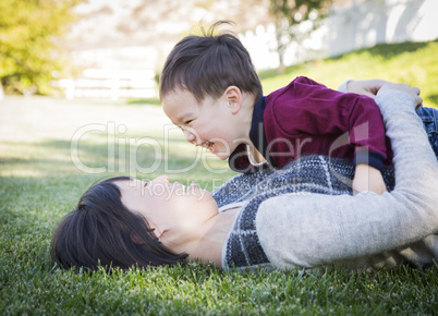 Chinese Mother Having Fun with Her Mixed Race Baby Son