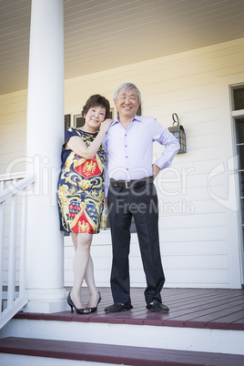 Attractive Chinese Couple Enjoying Their House