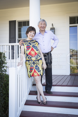 Attractive Chinese Couple Enjoying Their House