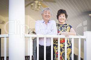 Attractive Chinese Couple Enjoying Their House