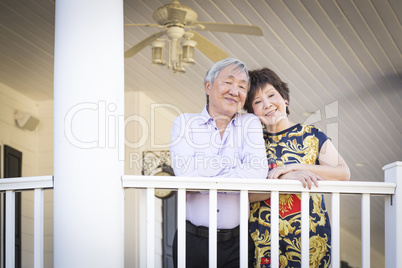 Attractive Chinese Couple Enjoying Their House