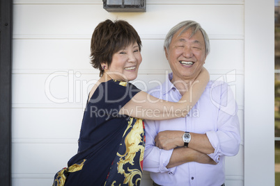 Attractive Chinese Couple Enjoying Their House