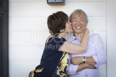 Attractive Chinese Couple Enjoying Their House