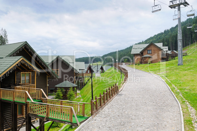 cottages, chair lift in Carpathian Mountains
