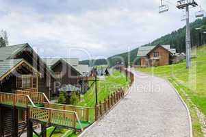cottages, chair lift in Carpathian Mountains