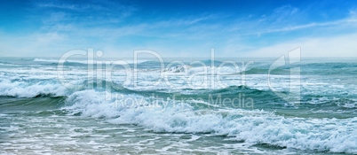 seascape, sand beach and blue sky