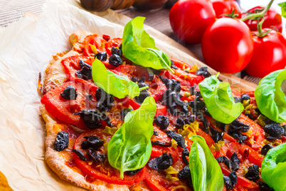 homemade olive - tomato pizza