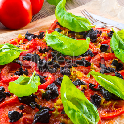 homemade olive - tomato pizza