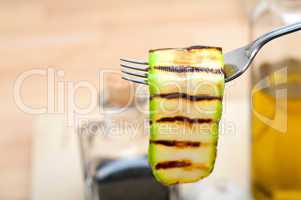 grilled zucchini courgette on a fork