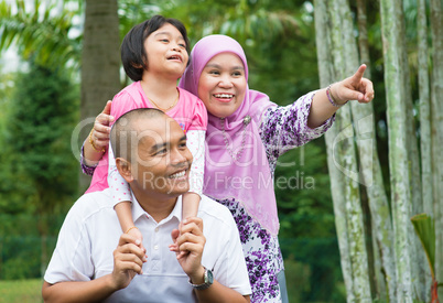 Asian Muslim family outdoor